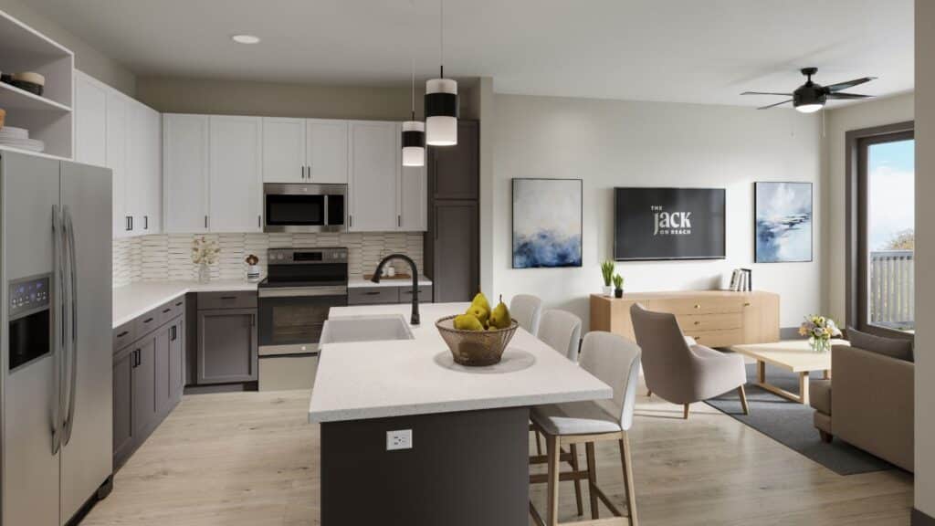 Modern kitchen and living area with white cabinets, gray island, stainless steel appliances, and neutral decor.